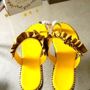 Yellow sandal with pineapple loop hole